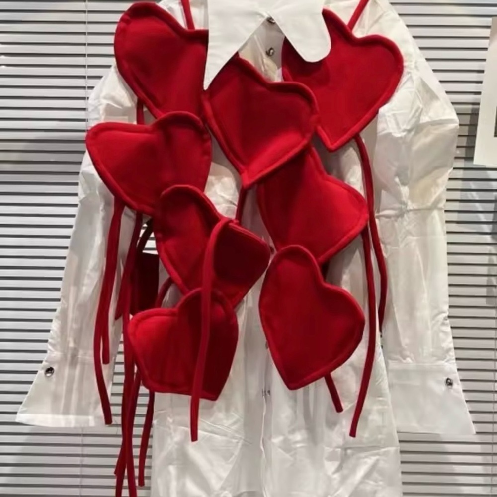 White Shirt with Red Heart Accents